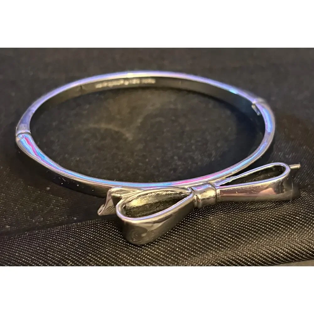 Kate Spade Silver Tone Bow Hinged Bangle Size 7